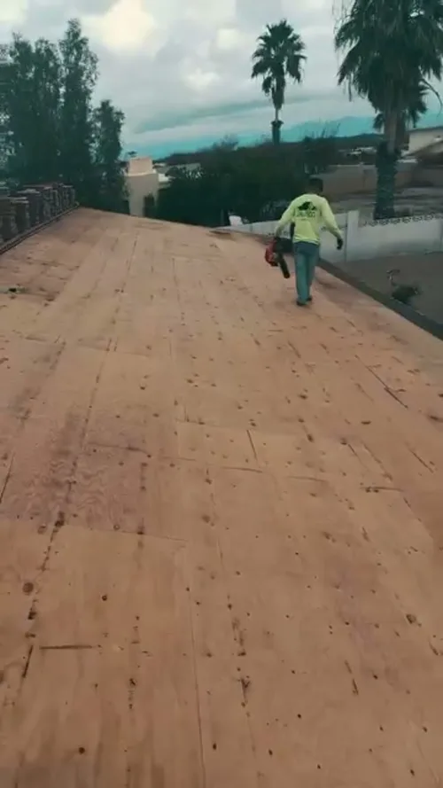 Jalisco crew member on fresh roof decking
